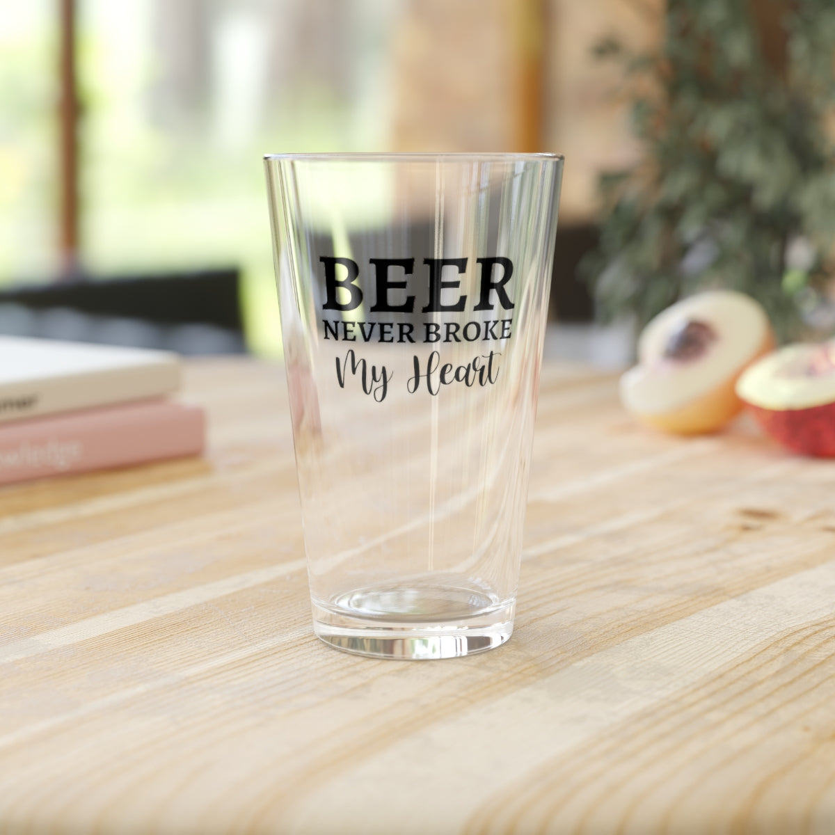 funny beer glass with quote "beer never broke my heart"